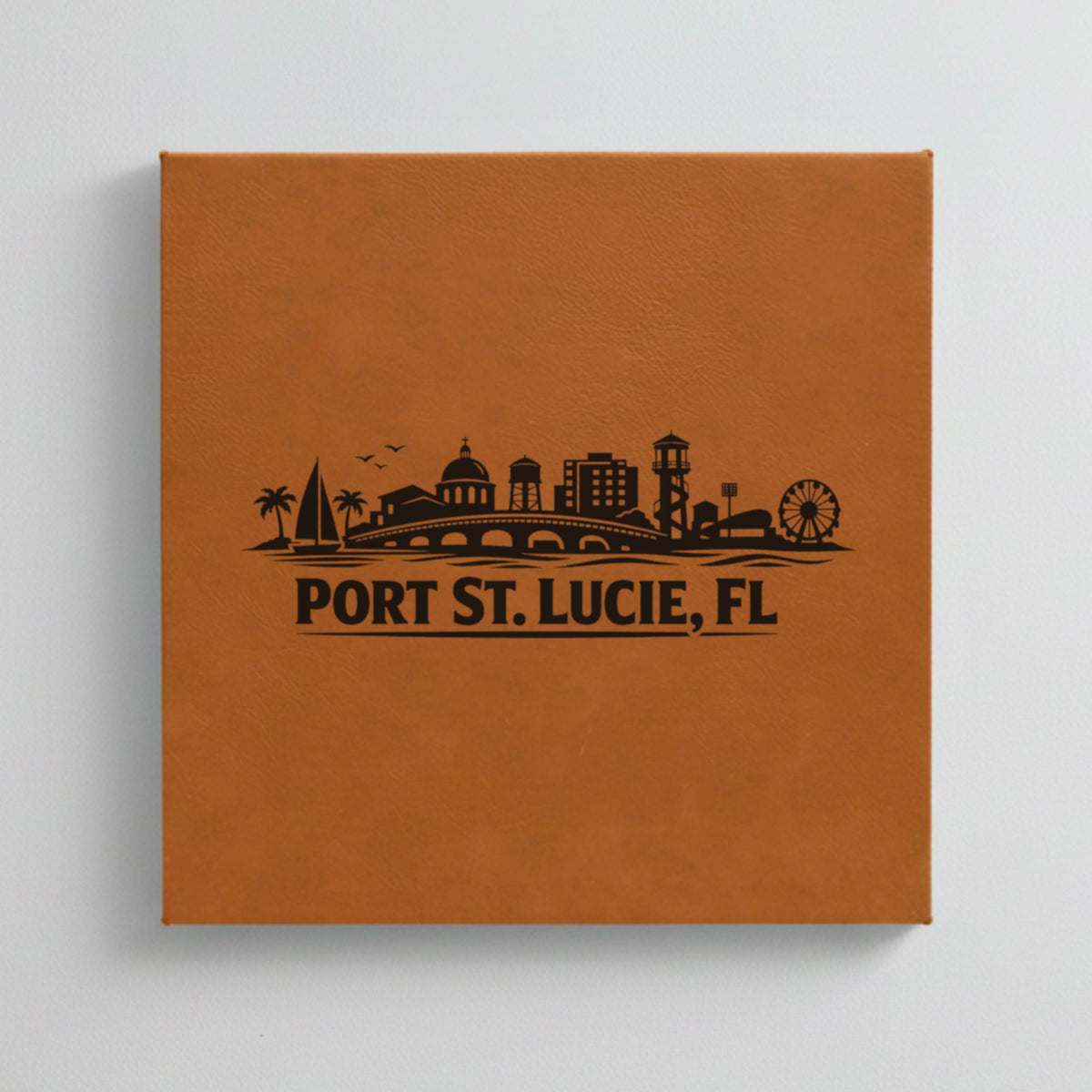 Close up of the Port St. Lucie, Florida skyline engraved on Brown leatherette