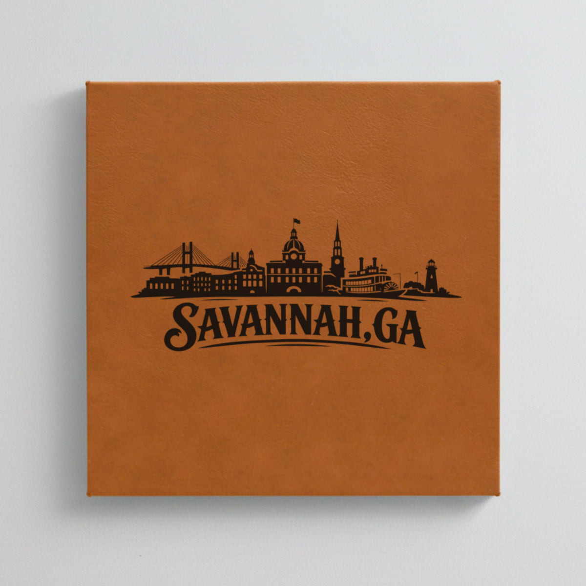 Close up of the Savannah, Georgia skyline engraved on Brown leatherette