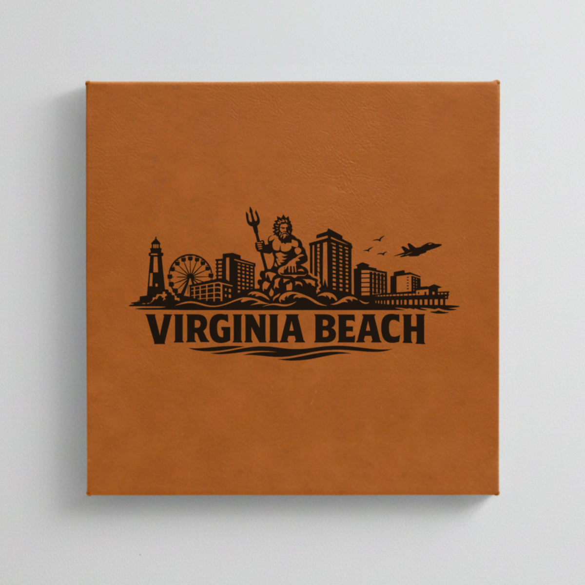 Close up of the Virginia Beach, Virginia skyline engraved on Brown leatherette