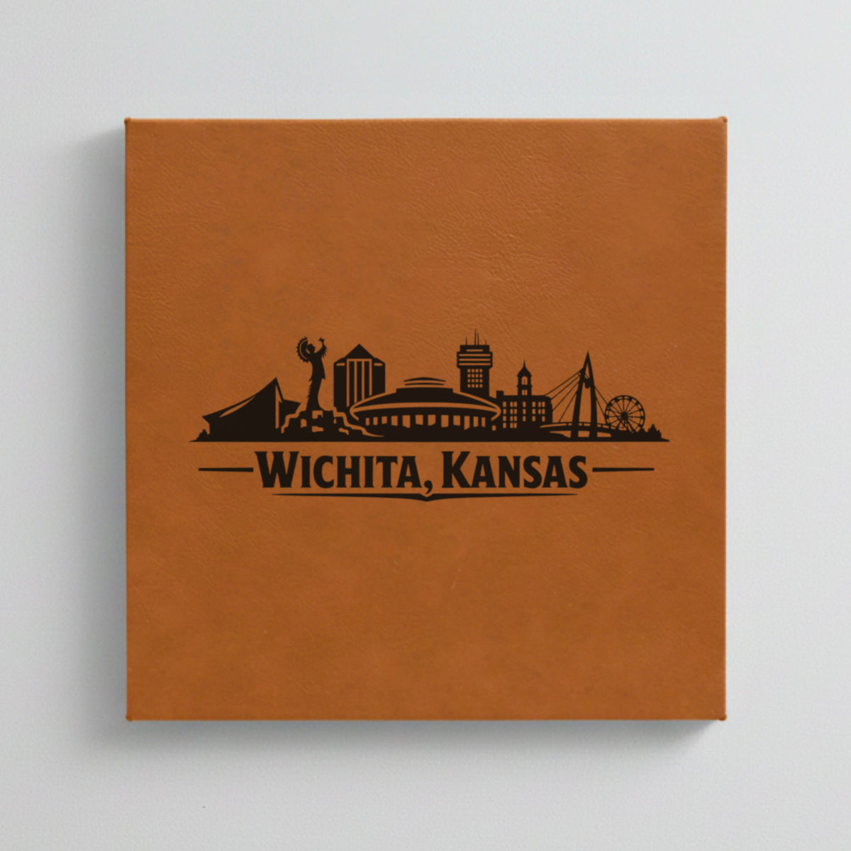 Close up of the Wichita, Kansas skyline engraved on Brown leatherette