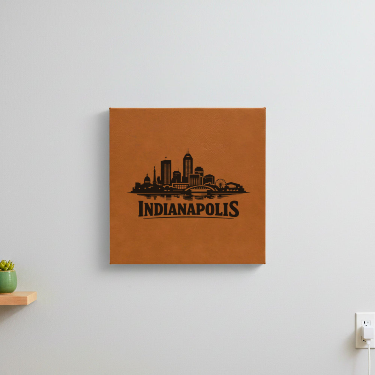 Brown leatherette wall sign engraved with the Indianapolis, Indiana skyline, hanging on a wall