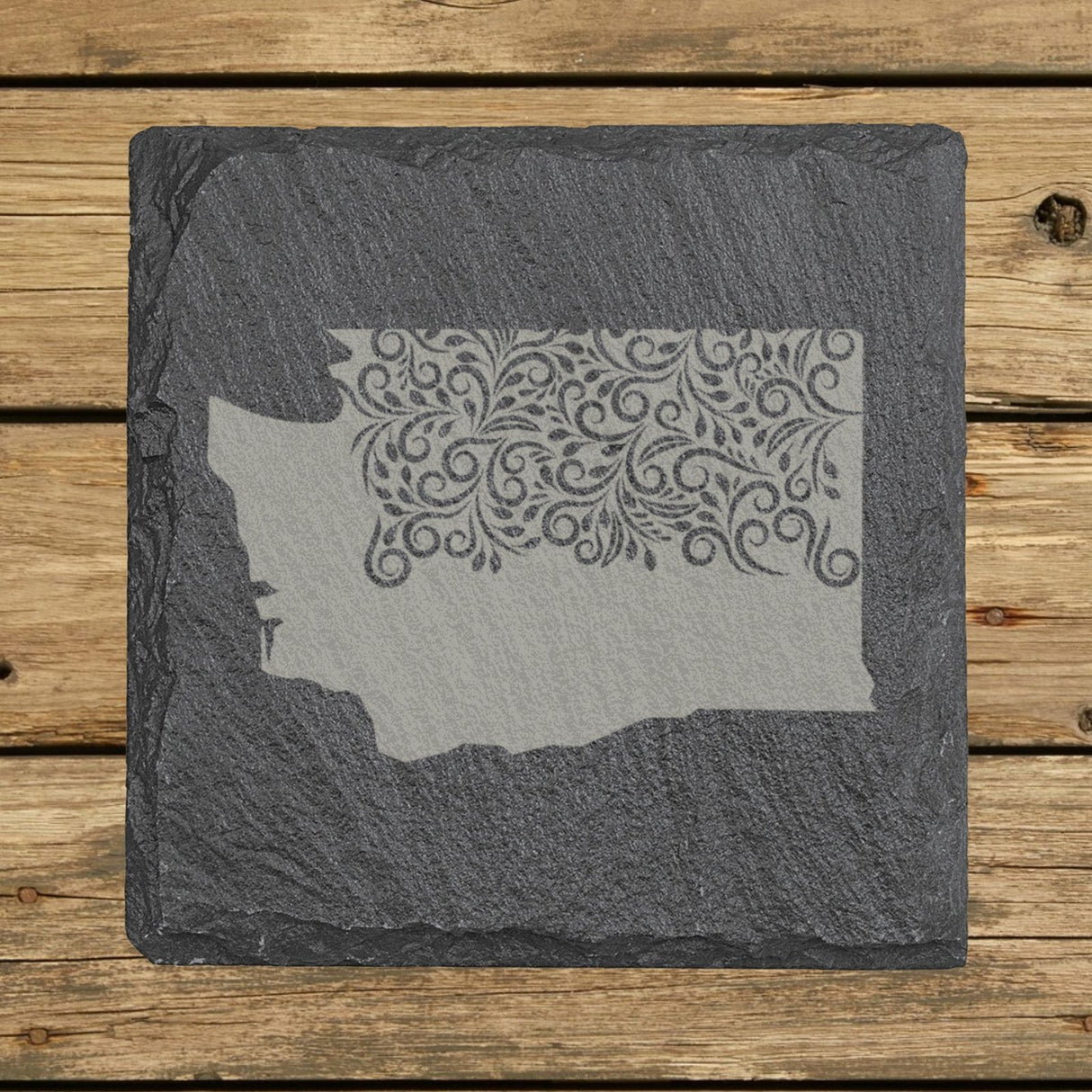 Washington square slate coaster engraved with the state shape in ornate floral scrollwork
