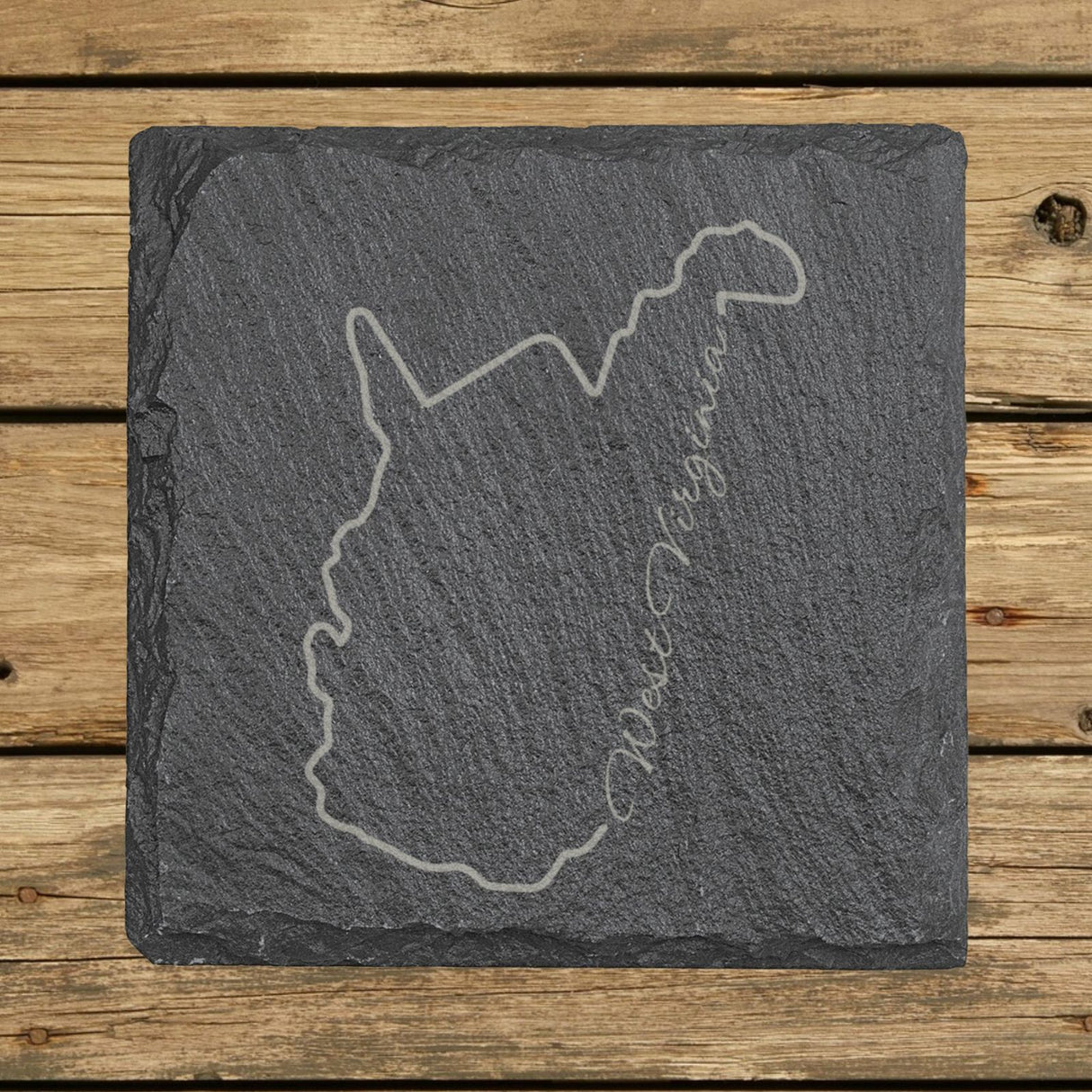 West Virginia square slate coaster engraved with the state outline and West Virginia in script lettering