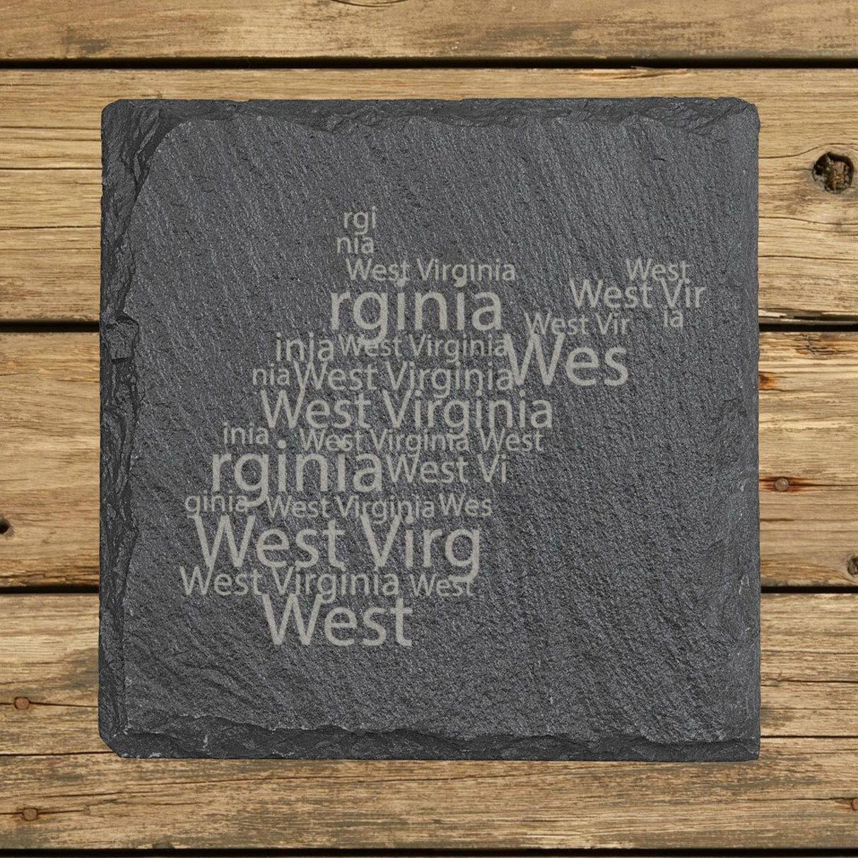 West Virginia square slate coaster engraved with a word cloud of repeating West Virginia text