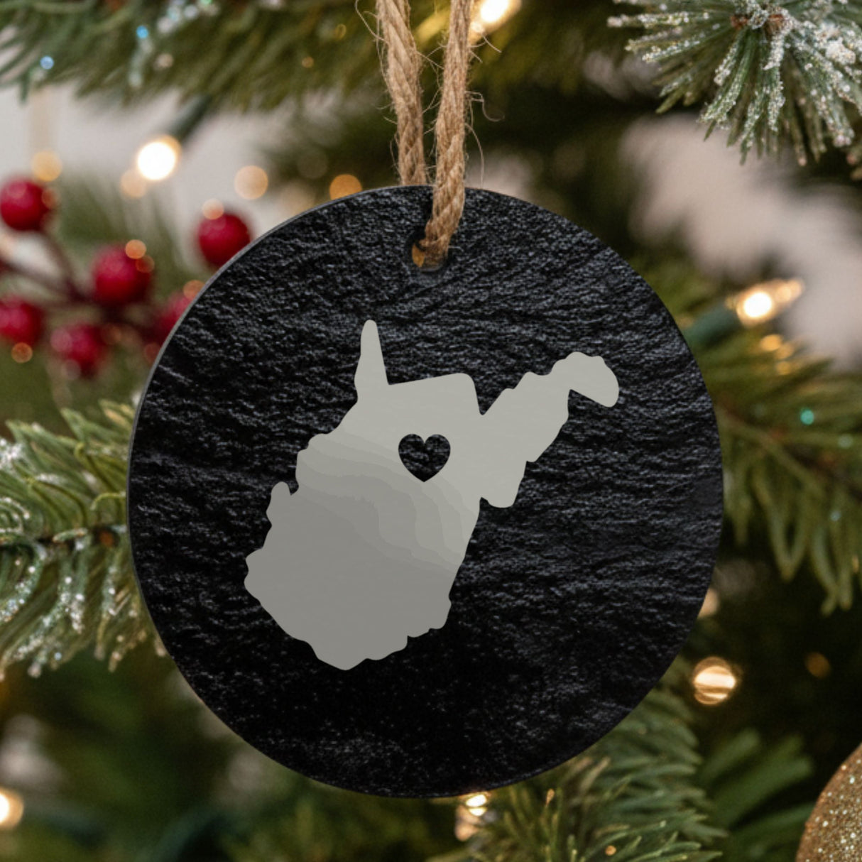 West Virginia round slate Christmas ornament engraved with the state shape and a heart
