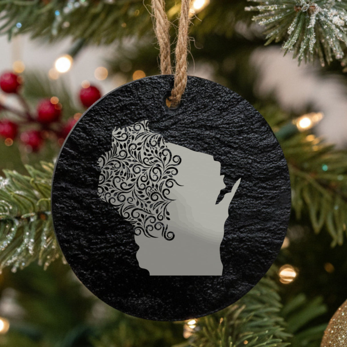 Wisconsin round slate Christmas ornament engraved with the state shape in ornate floral scrollwork