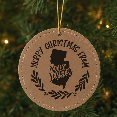 Brown leatherette Merry Christmas From New Jersey ornament with the state shape and a laurel wreath