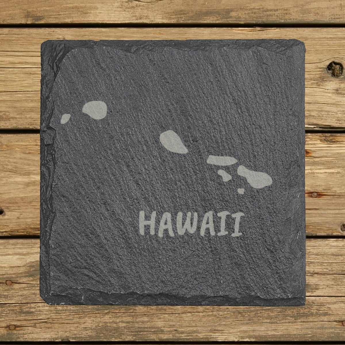 Hawaii square slate coaster engraved with the island outline and HAWAII in hand-drawn brush lettering