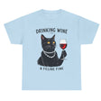 Black cat drinking wine Feline Fine cotton tee in light blue