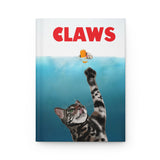 Hardcover Journal - CLAWS Poster featuring Flounder the Purrmaid and Mouse Toy Design