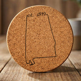 Alabama round cork coaster engraved with the state outline and est. 1819
