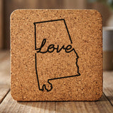 Alabama square cork coaster engraved with a hand-drawn state outline and love in cursive
