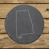 Alabama round slate coaster engraved with a clean state outline