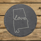 Alabama round slate coaster engraved with a hand-drawn state outline and love in cursive
