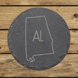 Alabama round slate coaster engraved with the state outline and AL initials
