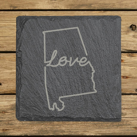 Alabama square slate coaster engraved with a hand-drawn state outline and love in cursive