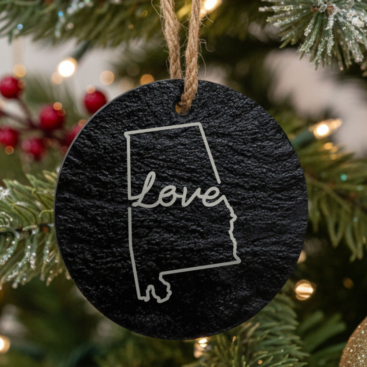 Alabama round slate Christmas ornament engraved with a hand-drawn state outline and love in cursive