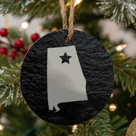 Alabama round slate Christmas ornament engraved with the state shape and a star