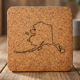 Alaska square cork coaster engraved with a clean state outline