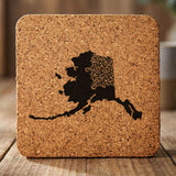 Alaska square cork coaster engraved with the state shape in ornate floral scrollwork