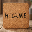 Alaska square cork coaster engraved with HOME using the state outline as the letter O