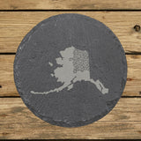 Alaska round slate coaster engraved with the state shape in ornate floral scrollwork
