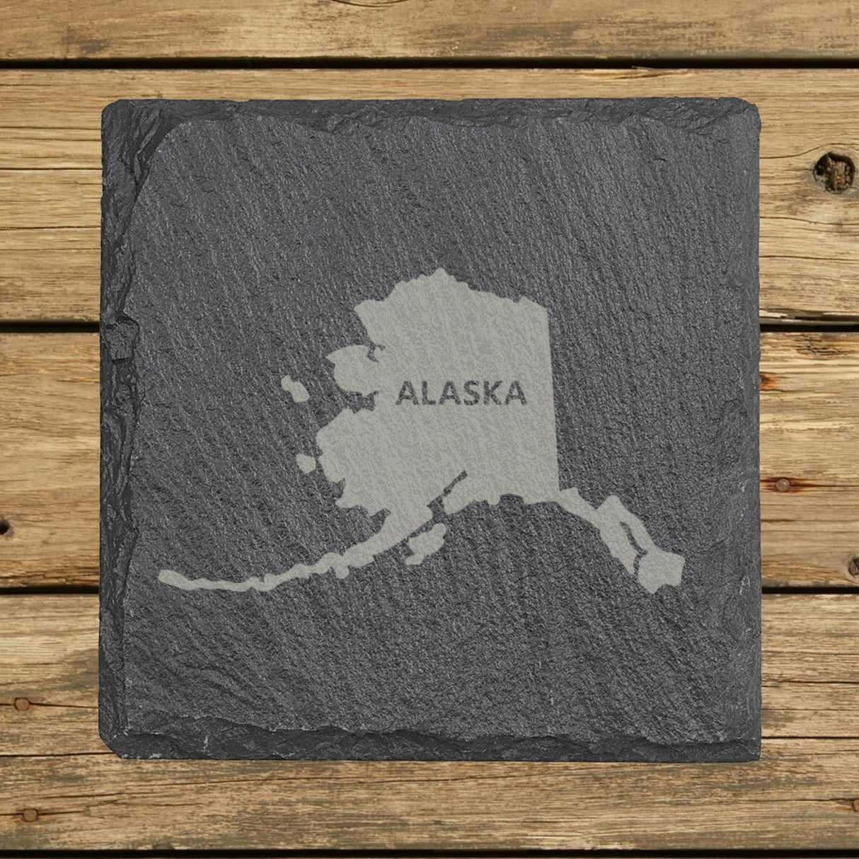 Alaska square slate coaster engraved with the state shape and ALASKA in bold lettering