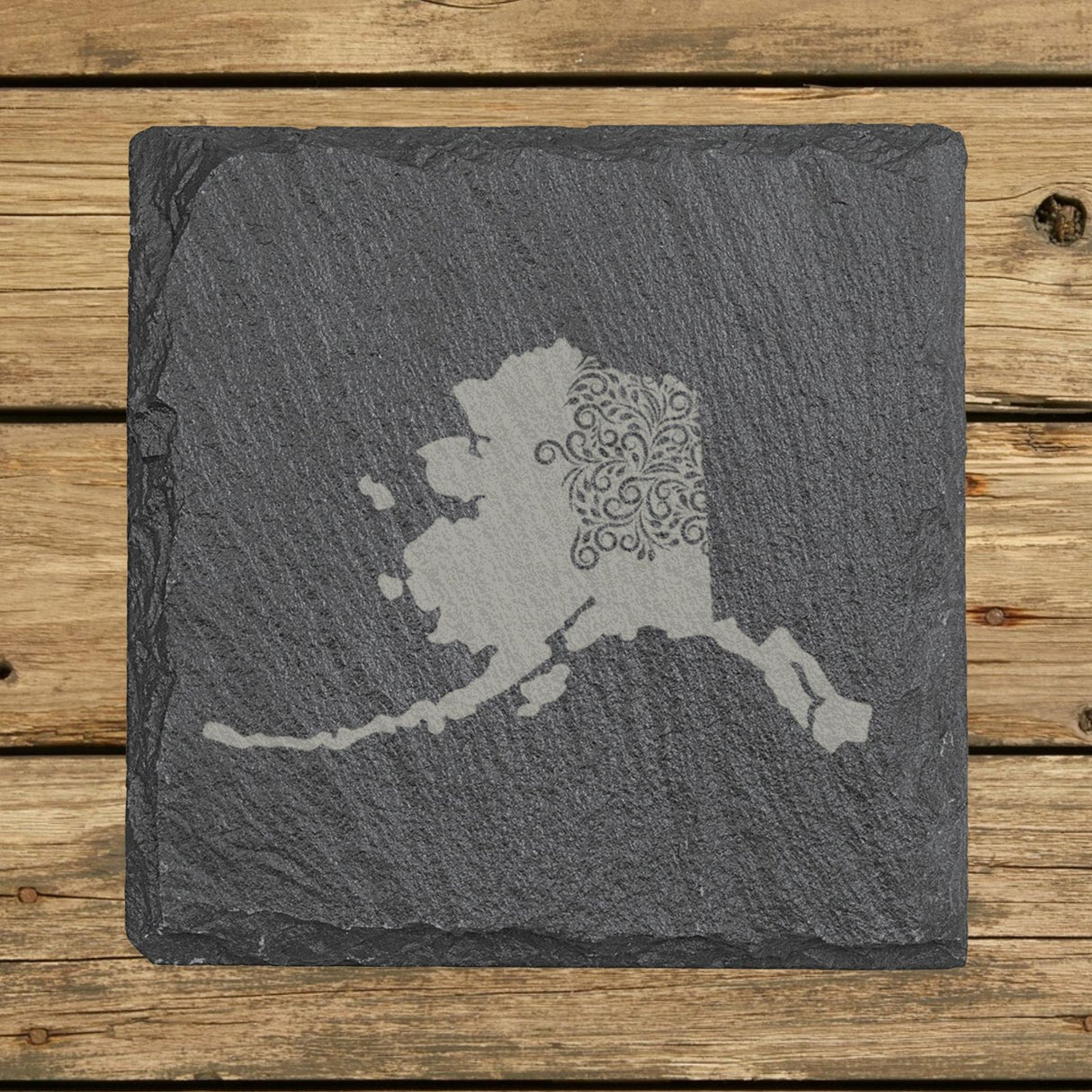 Alaska square slate coaster engraved with the state shape in ornate floral scrollwork