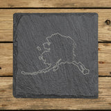 Alaska square slate coaster engraved with the state outline and Alaska in script lettering