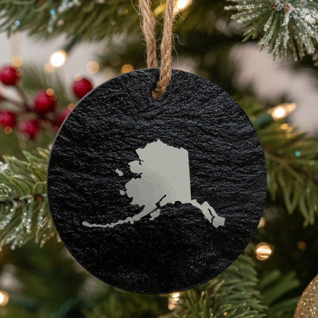 Alaska round slate Christmas ornament with the full state shape engraved