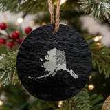 Alaska round slate Christmas ornament engraved with the state shape in ornate floral scrollwork