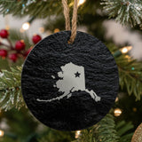 Alaska round slate Christmas ornament engraved with the state shape and a star