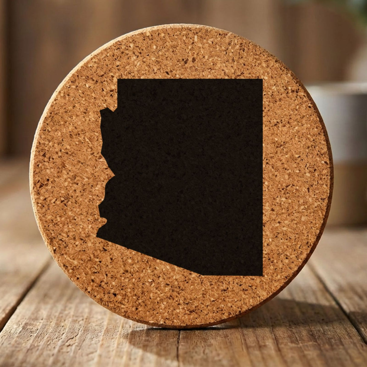 Arizona round cork coaster with the full state shape engraved