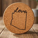 Arizona round cork coaster engraved with a hand-drawn state outline and love in cursive