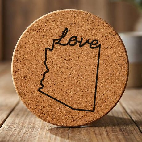 Arizona round cork coaster engraved with a hand-drawn state outline and love in cursive