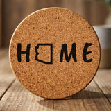 Arizona round cork coaster engraved with HOME using the state outline as the letter O