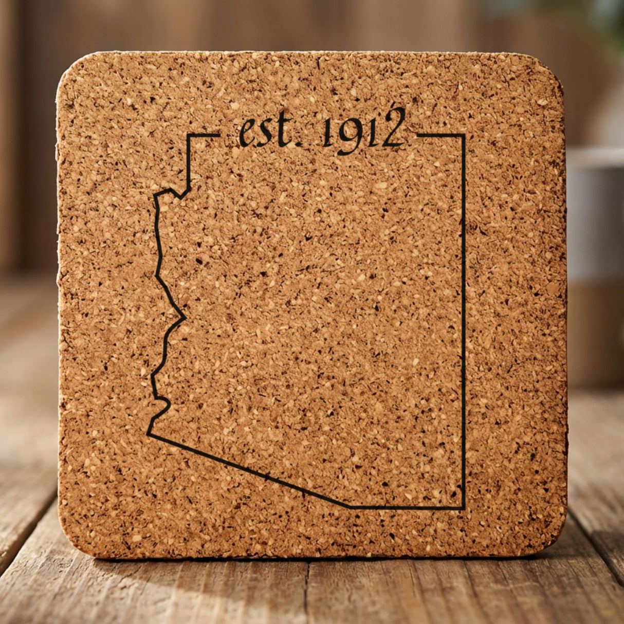 Arizona square cork coaster engraved with the state outline and est. 1912
