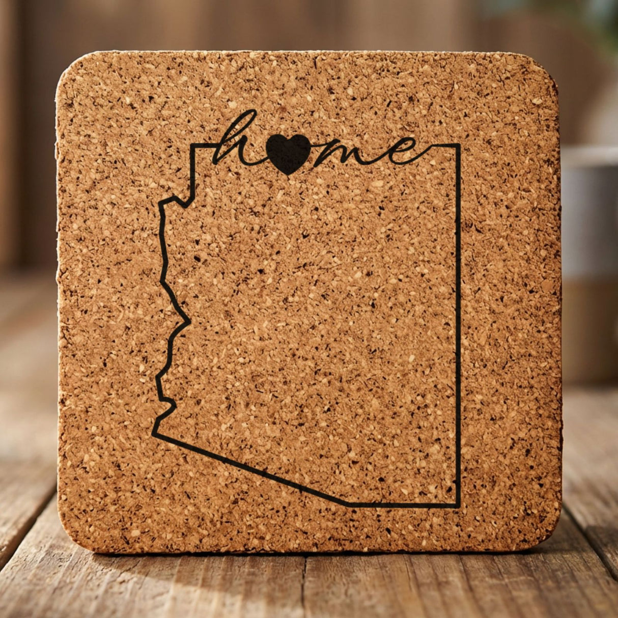 Arizona square cork coaster engraved with the state outline and home in script with a heart