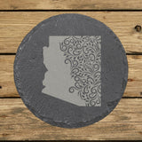 Arizona round slate coaster engraved with the state shape in ornate floral scrollwork