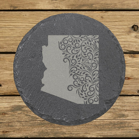 Arizona round slate coaster engraved with the state shape in ornate floral scrollwork