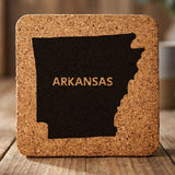 Arkansas square cork coaster engraved with the state shape and ARKANSAS in bold lettering