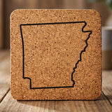 Arkansas square cork coaster engraved with a clean state outline