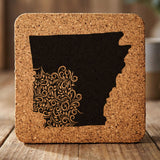 Arkansas square cork coaster engraved with the state shape in ornate floral scrollwork