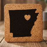 Arkansas square cork coaster engraved with the state shape and a heart