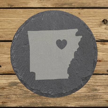 Arkansas round slate coaster engraved with the state shape and a heart
