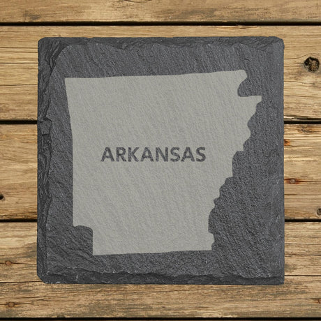 Arkansas square slate coaster engraved with the state shape and ARKANSAS in bold lettering