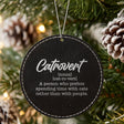 Black leatherette Christmas ornament engraved with the Catrovert definition