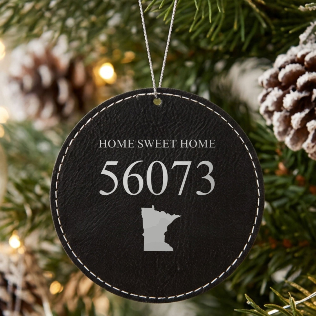 Black leatherette Christmas ornament laser engraved with the Home Sweet Home State zip code design