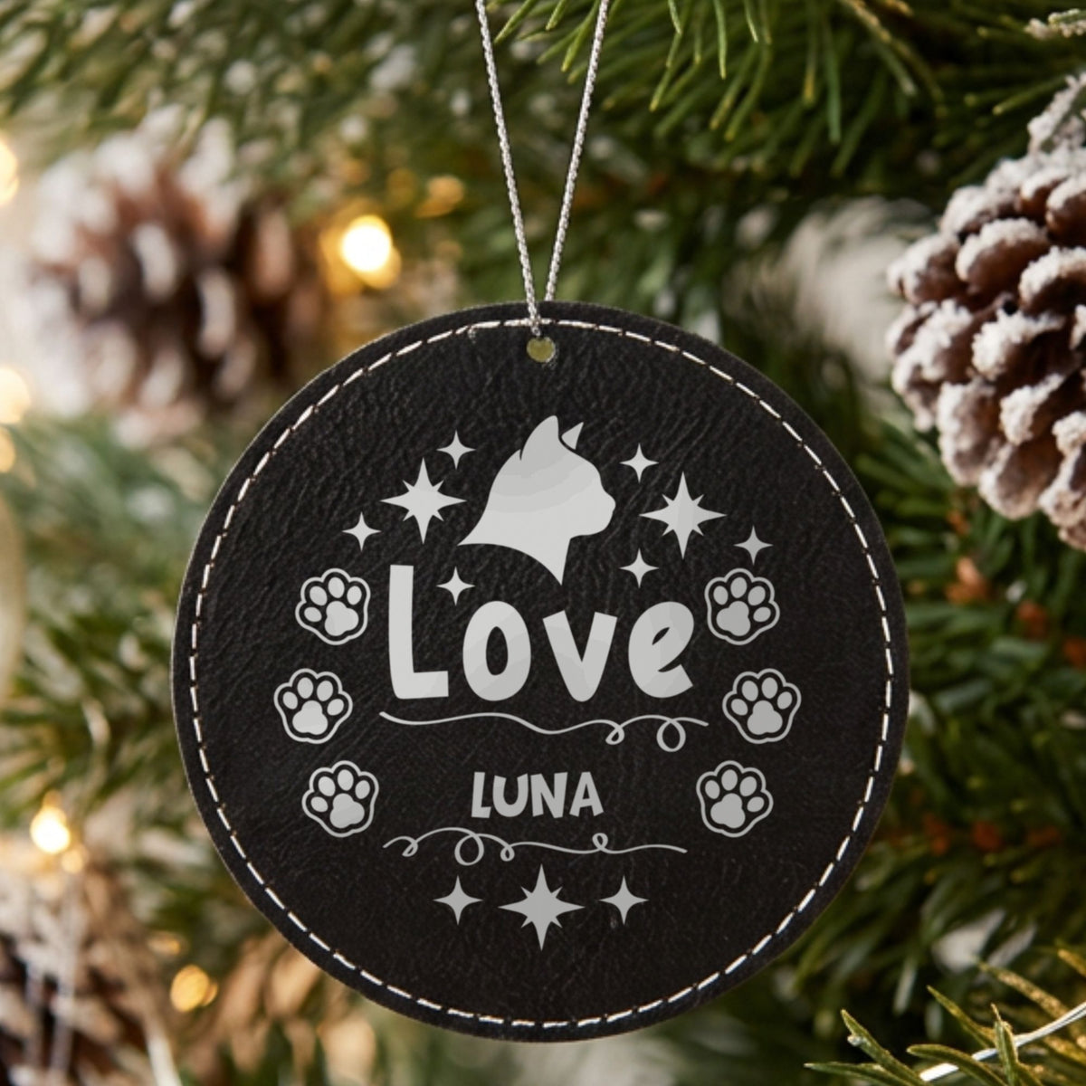 Black leatherette Christmas ornament engraved with the Love cat design and a sample pet name