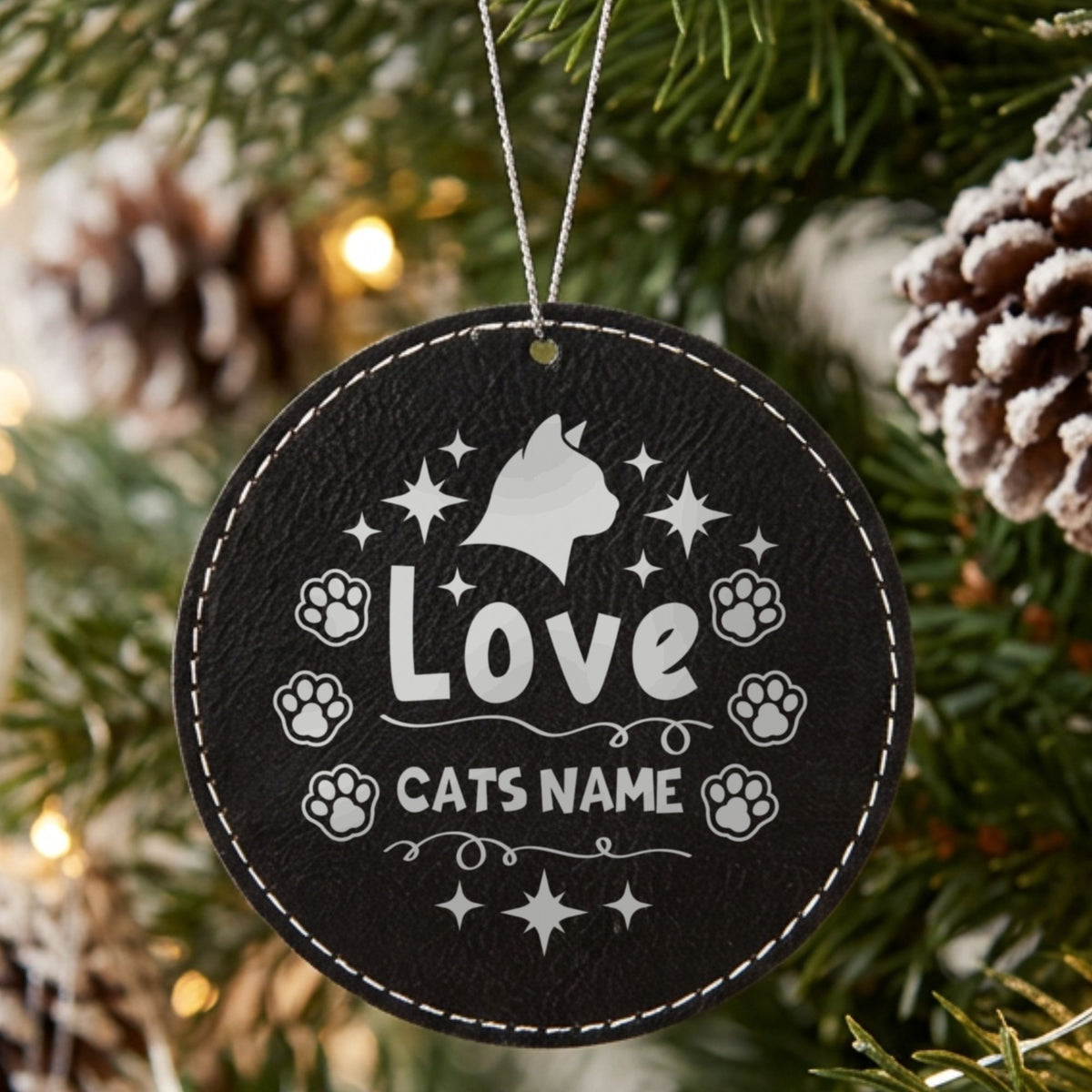 Black leatherette Christmas ornament engraved with the Love cat design
